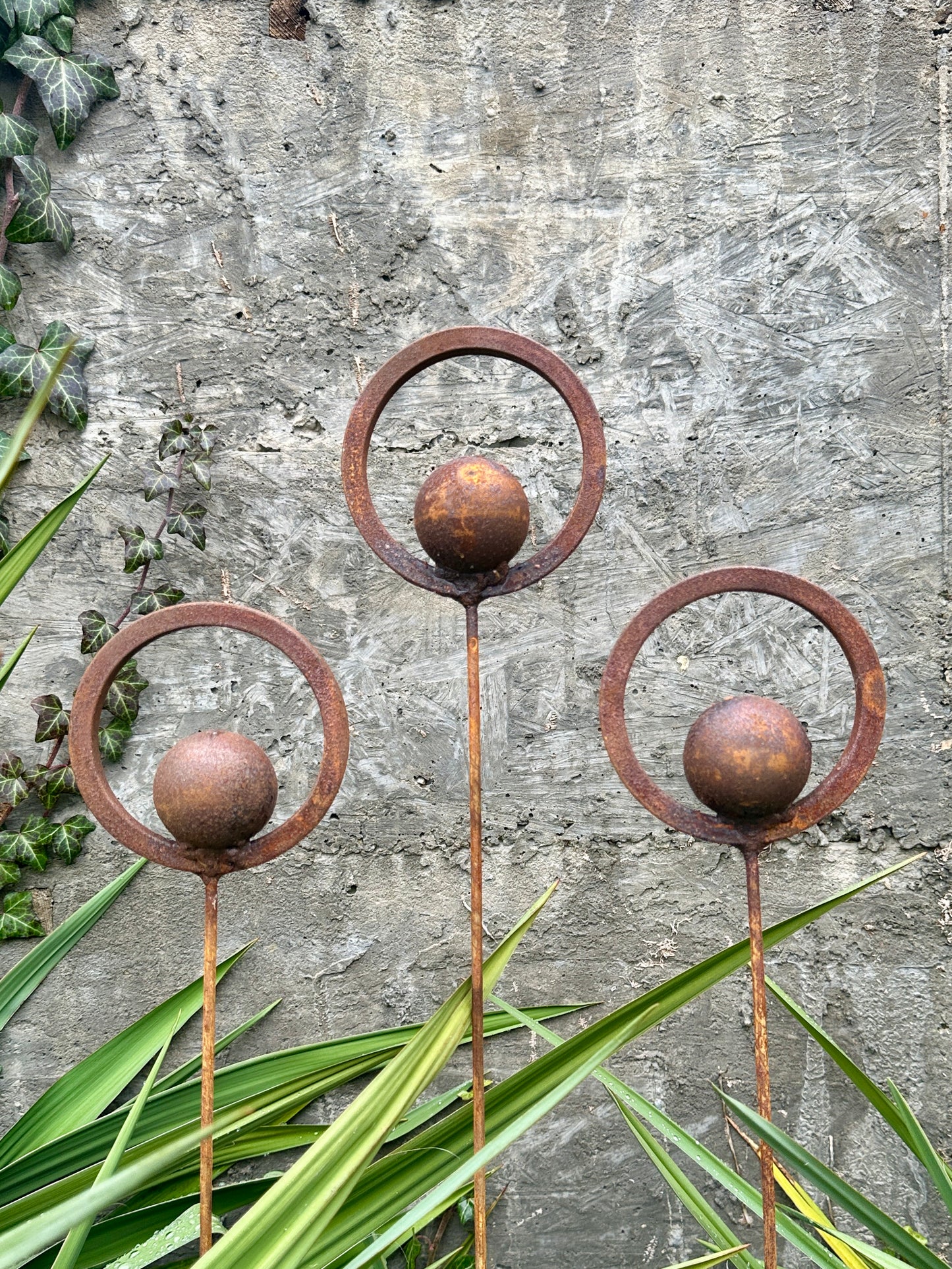 Set of 3 Rusty Metal Garden Stakes and Finials: Rustic Outdoor Metal Decor for Your Garden.