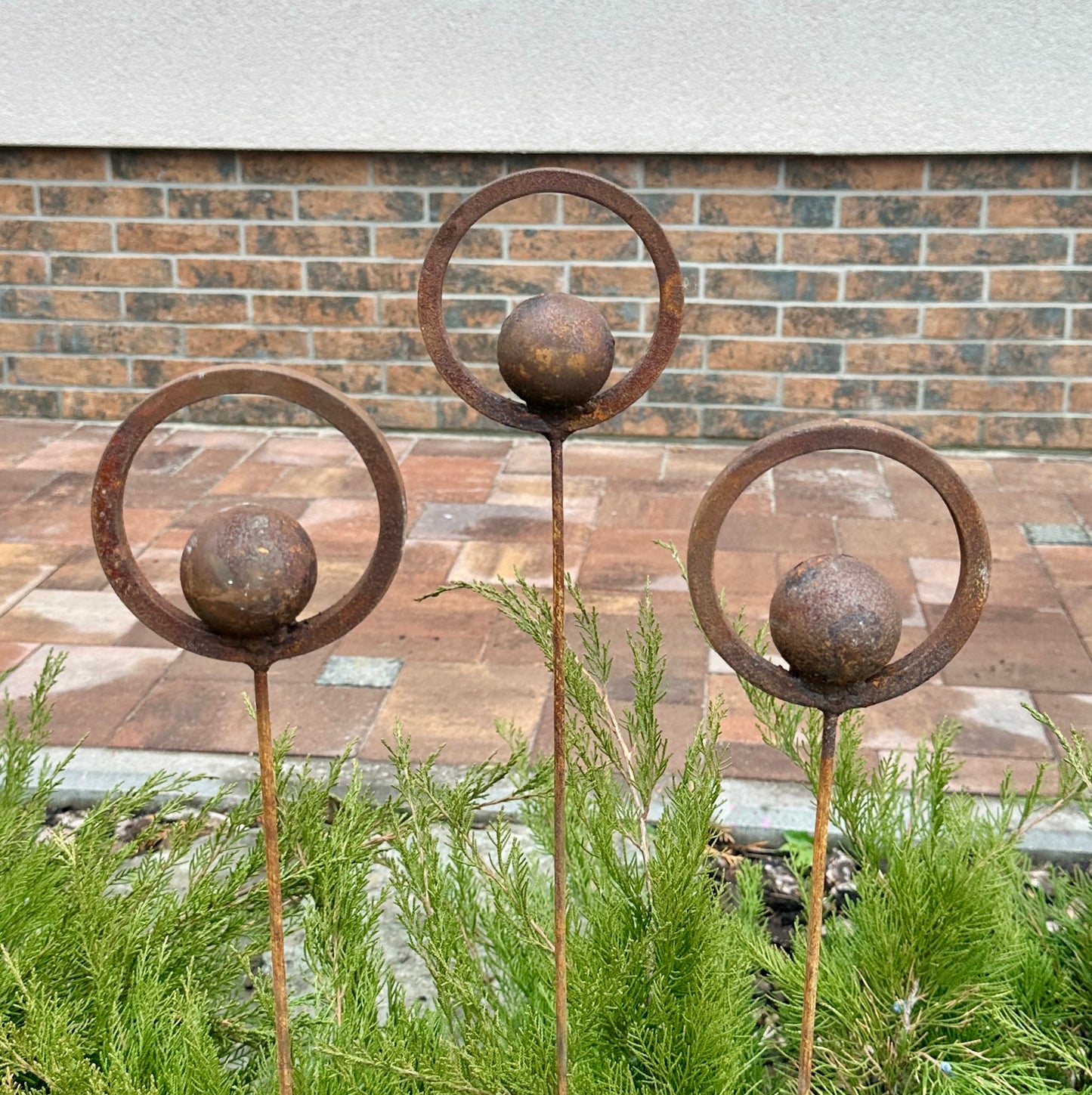 Set of 3 Rusty Metal Garden Stakes and Finials: Rustic Outdoor Metal Decor for Your Garden.