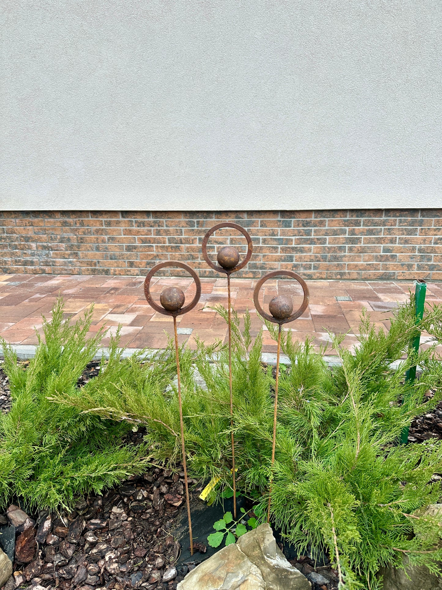 Set of 3 Rusty Metal Garden Stakes and Finials: Rustic Outdoor Metal Decor for Your Garden.