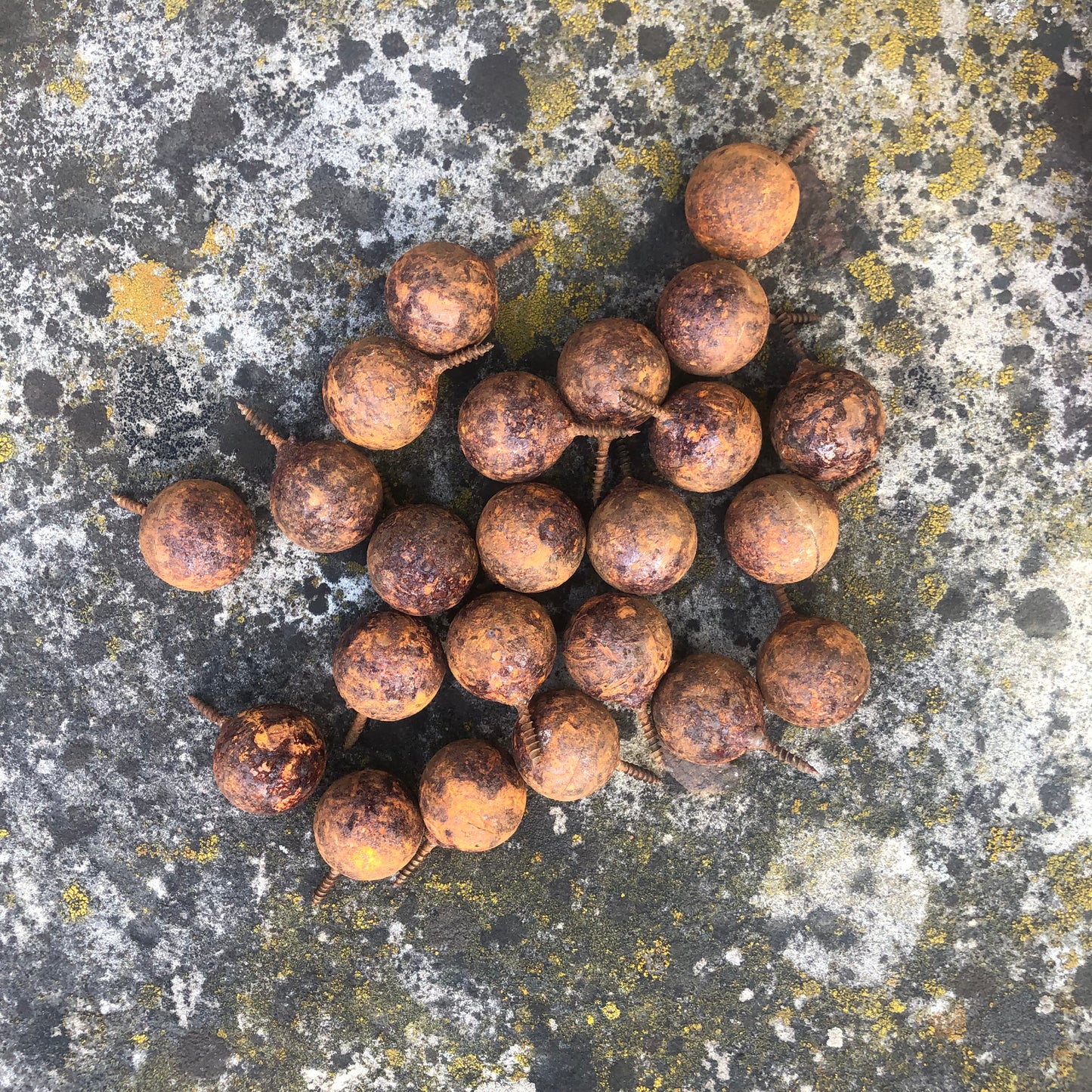 Fifty handmade rusted metal balls with screw attachment in sizes from 1.2 to 3.9 inches - unique decor for walls or fencing