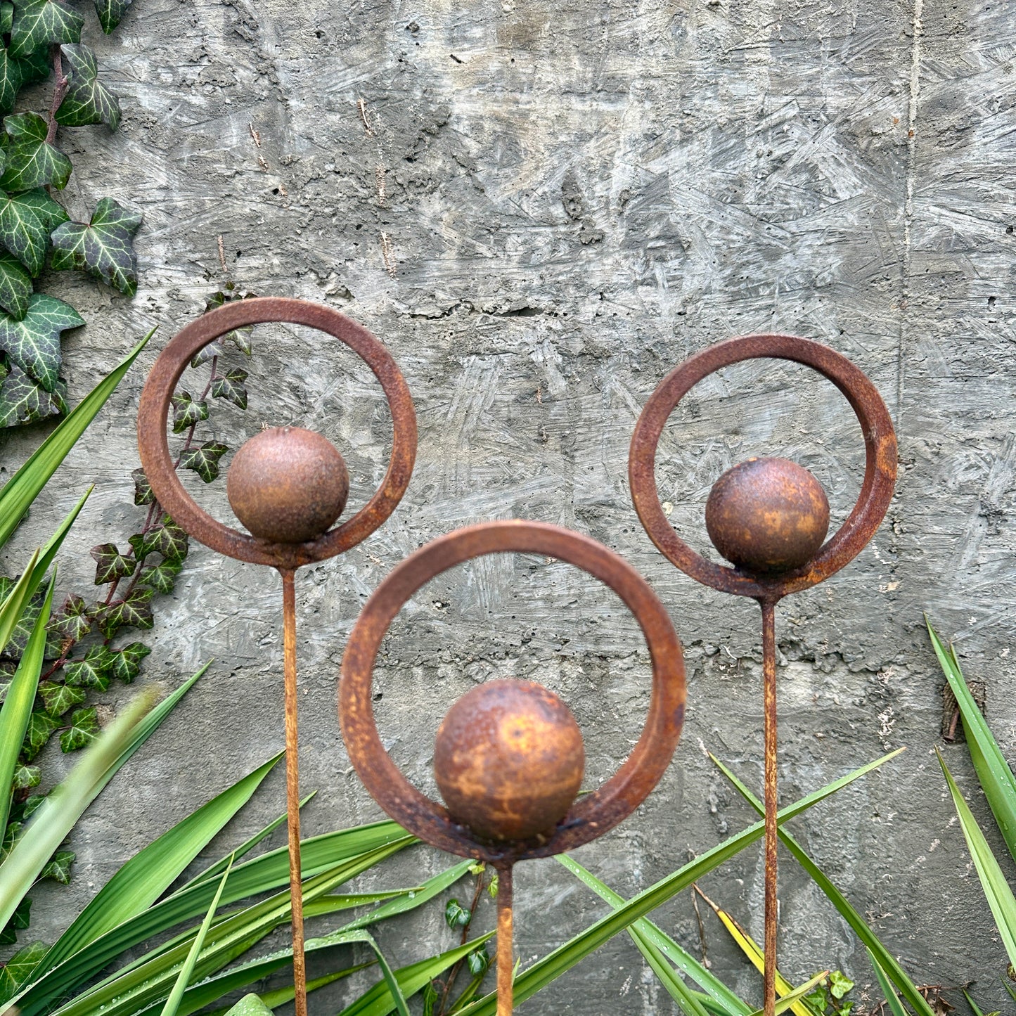 Set of 3 Rusty Metal Garden Stakes and Finials: Rustic Outdoor Metal Decor for Your Garden.
