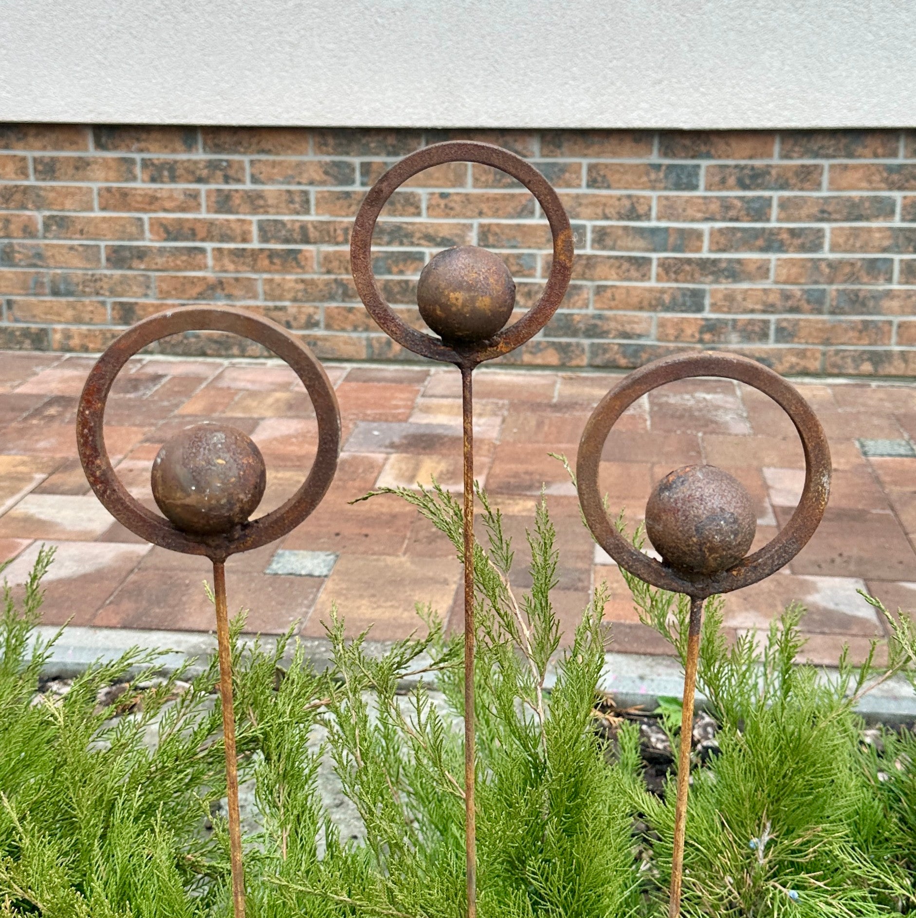 Set of 3 Rusty Metal Garden Stakes and Finials: Rustic Outdoor Metal Decor for Your Garden.