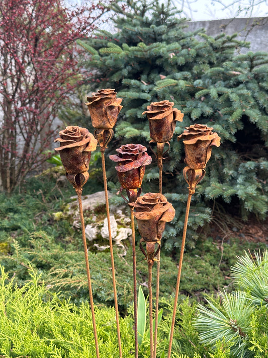 Six Rusty metal flowers &nbsp;- about 35” (90 cm) high and 4” (10 cm) in diameter. Weight is around 0,3 lbs (350 gr) each.