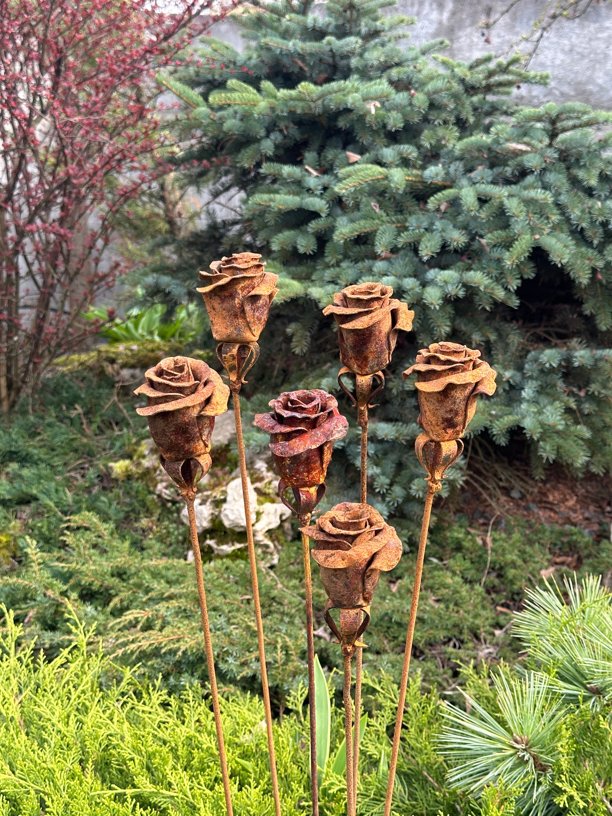 Six Rusty metal flowers &nbsp;- about 35” (90 cm) high and 4” (10 cm) in diameter. Weight is around 0,3 lbs (350 gr) each.