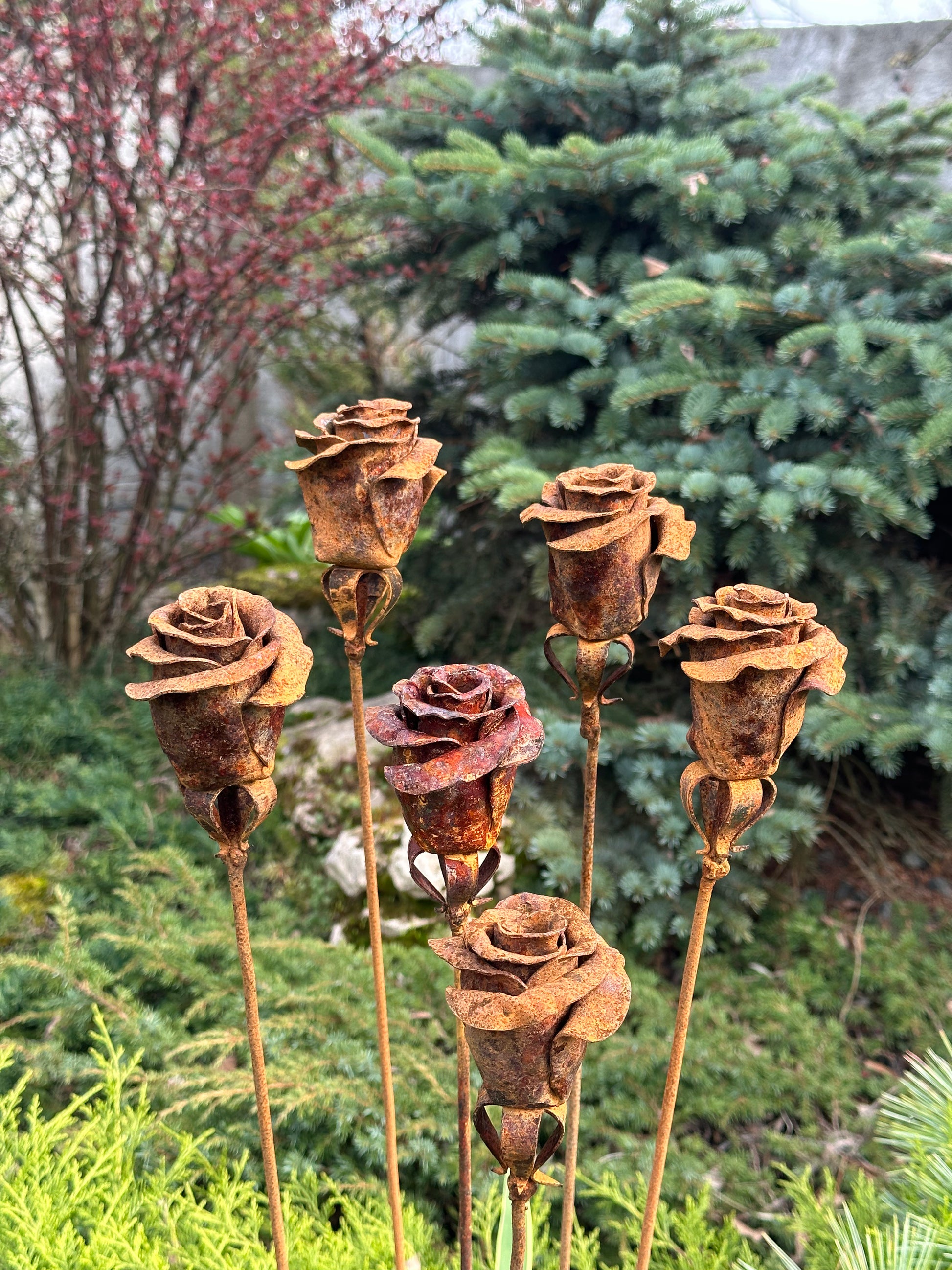 Six Rusty metal flowers &nbsp;- about 35” (90 cm) high and 4” (10 cm) in diameter. Weight is around 0,3 lbs (350 gr) each.
