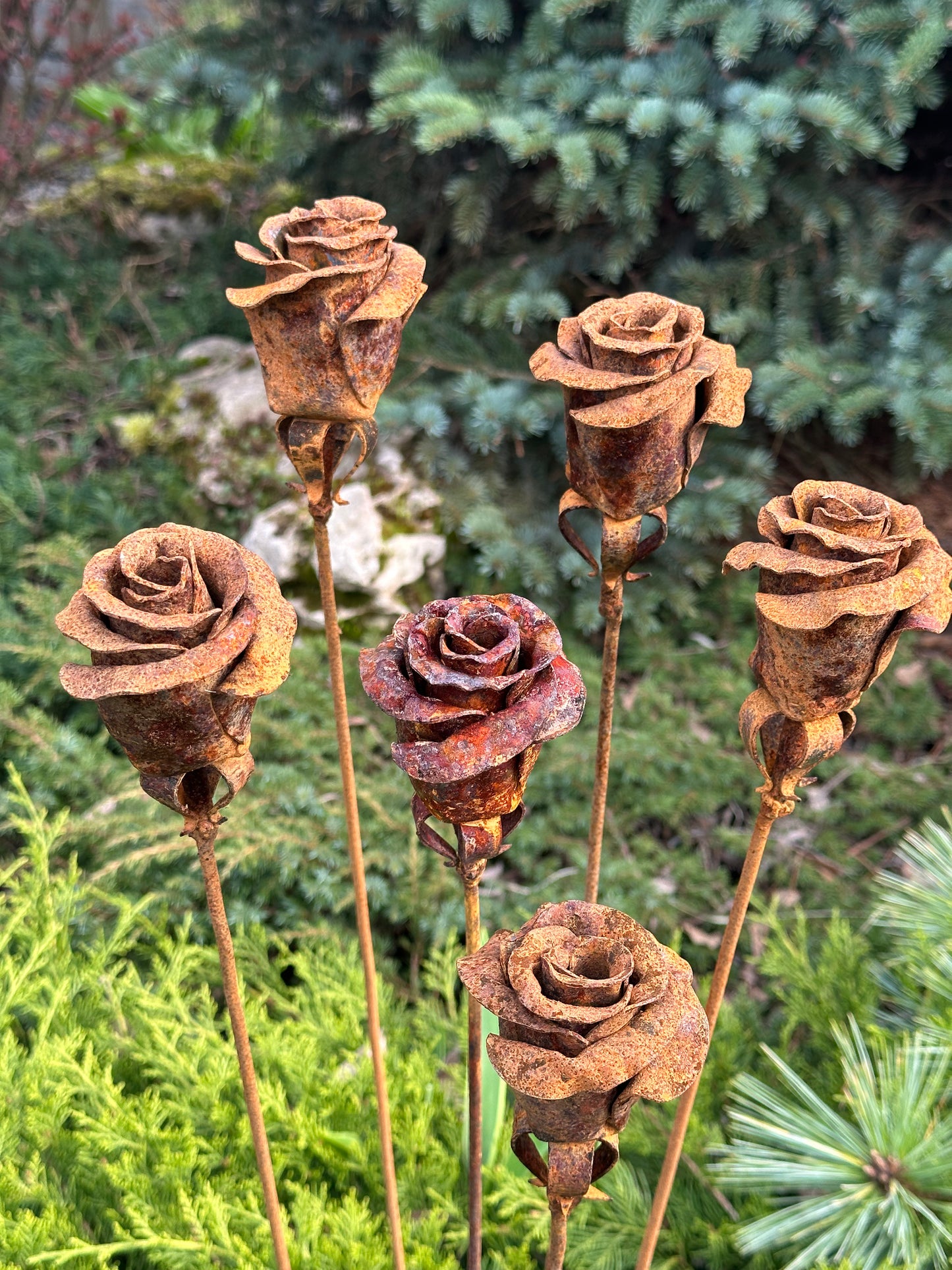 Six Rusty metal flowers &nbsp;- about 35” (90 cm) high and 4” (10 cm) in diameter. Weight is around 0,3 lbs (350 gr) each.