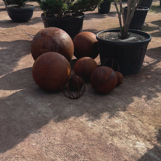 Big set of nine rusty metal spheres  27”, 20”, 14” and 8”  in diameter - Contemporary Minimalistic Outdoor Garden Globes