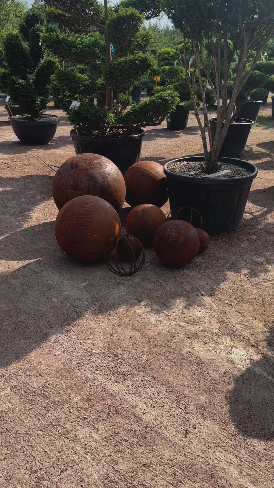 Big set of nine rusty metal spheres  27”, 20”, 14” and 8”  in diameter - Contemporary Minimalistic Outdoor Garden Globes