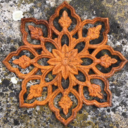 Rusty Metal Wall Decor: Add Vintage Charm to Your Home with Rustic Cast Iron Wall Hanging, Perfect for Rustic Home Decor.