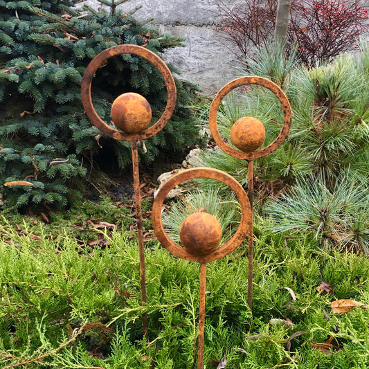 Set of 3 Rusty Metal Garden Stakes and Finials: Rustic Outdoor Metal Decor for Your Garden.