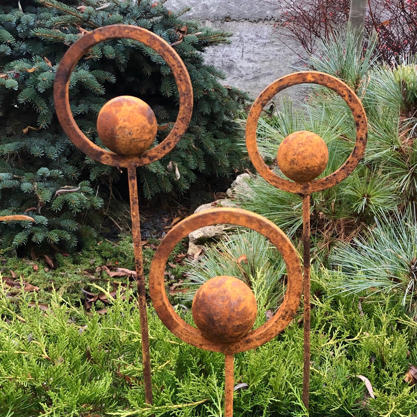 Set of 3 Rusty Metal Garden Stakes and Finials: Rustic Outdoor Metal Decor for Your Garden.