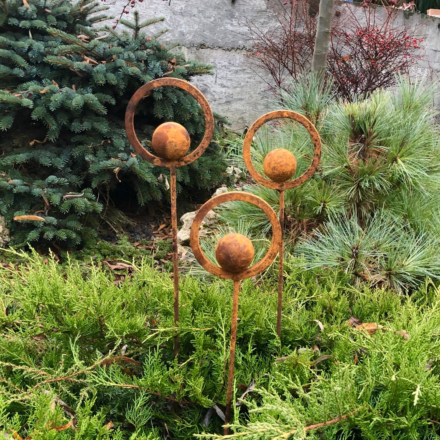 Set of 3 Rusty Metal Garden Stakes and Finials: Rustic Outdoor Metal Decor for Your Garden.