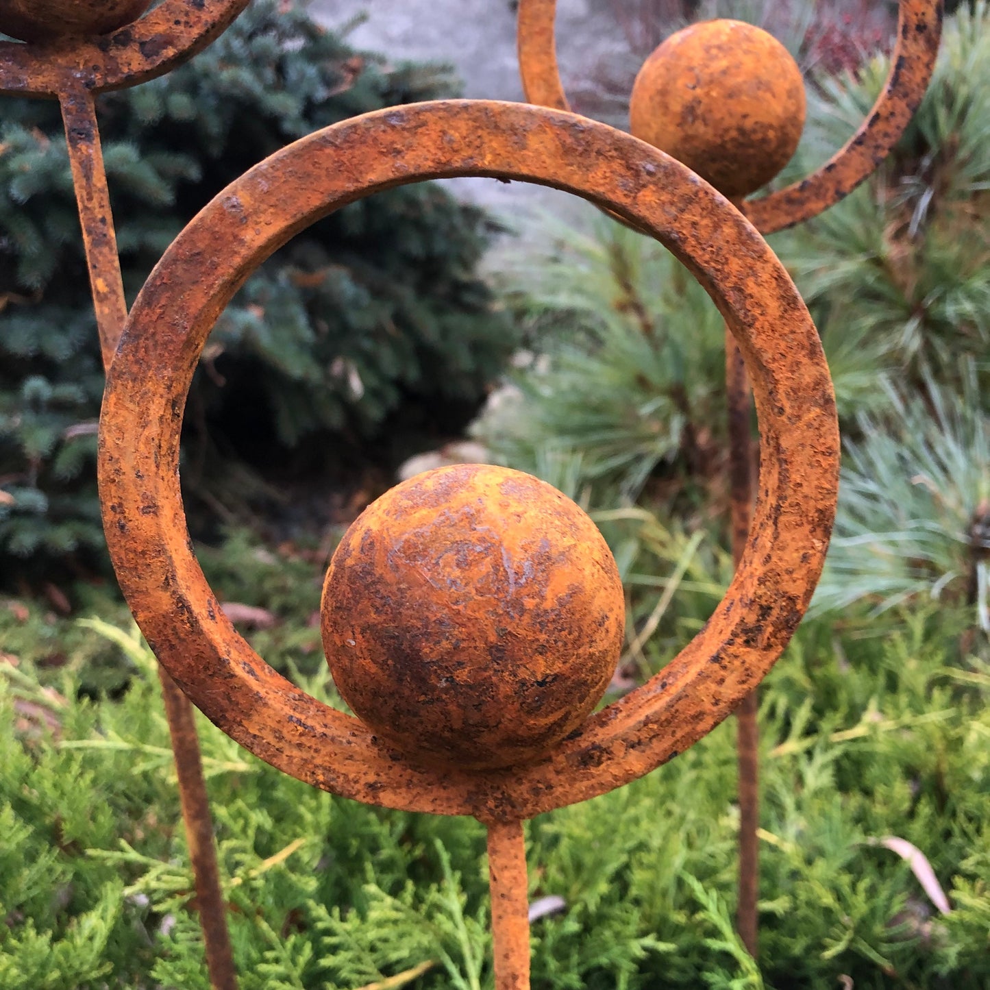 Set of 3 Rusty Metal Garden Stakes and Finials: Rustic Outdoor Metal Decor for Your Garden.