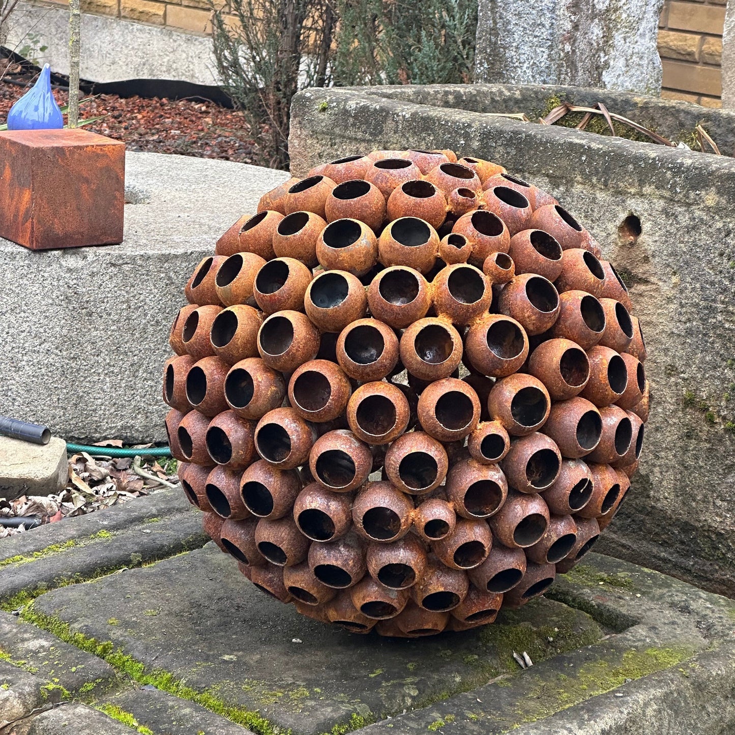 This Big 20” Abstract Rusty metal ball sculpture will place decorative accent in the garden compositions and landscape, create an atmosphere of romance and coziness in your home and become an awesome piece of rusty metal art.