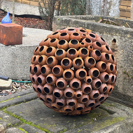 This Big 20” Abstract Rusty metal ball sculpture will place decorative accent in the garden compositions and landscape, create an atmosphere of romance and coziness in your home and become an awesome piece of rusty metal art.