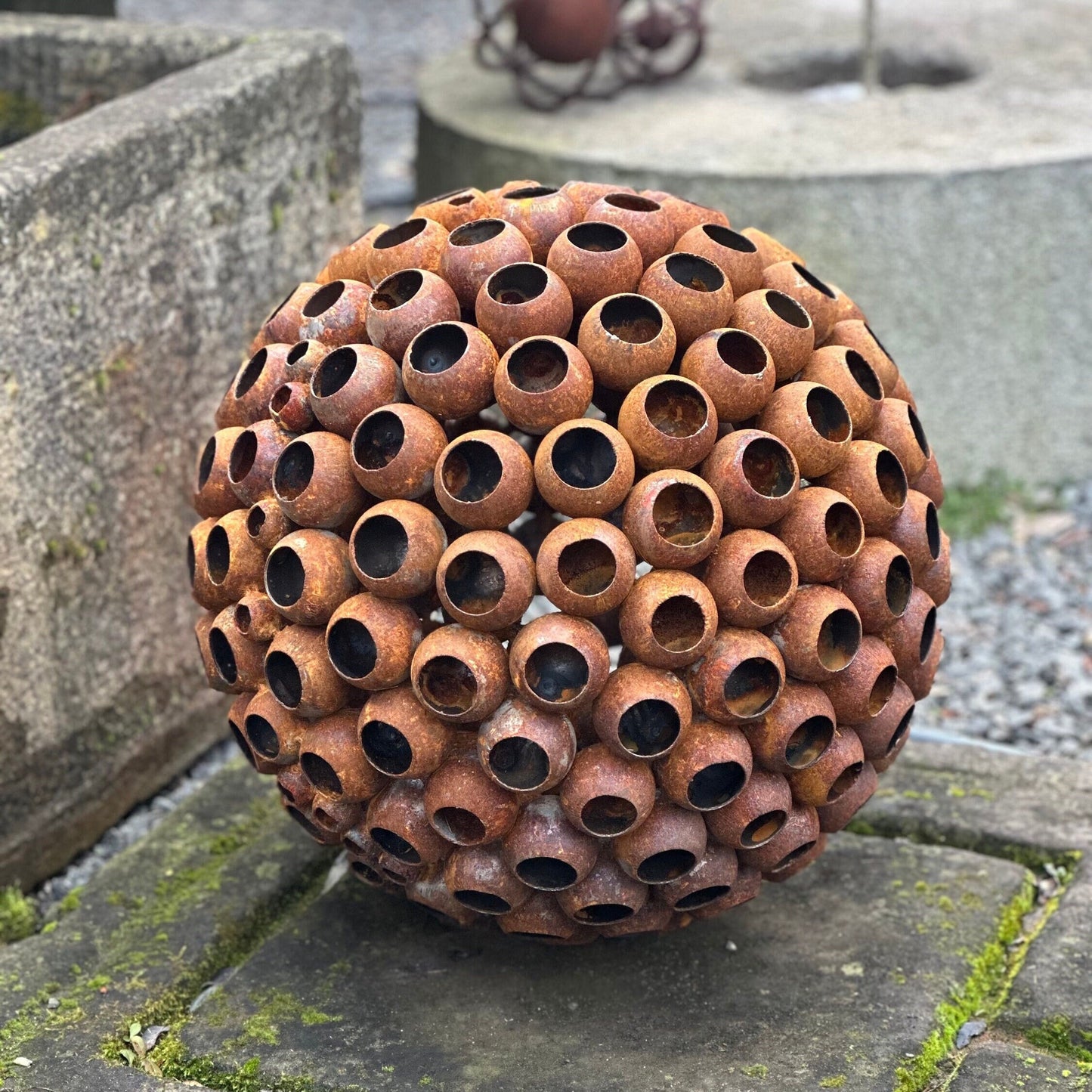 This Big 20” Abstract Rusty metal ball sculpture will place decorative accent in the garden compositions and landscape, create an atmosphere of romance and coziness in your home and become an awesome piece of rusty metal art.