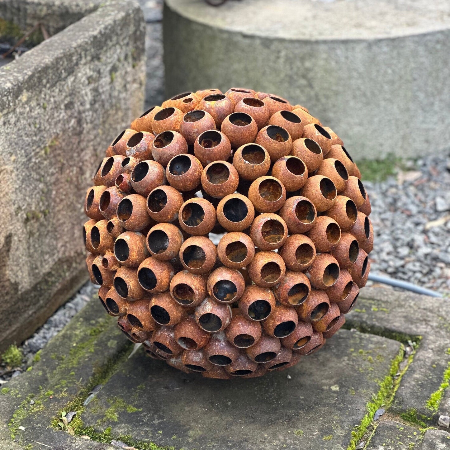 This Big 20” Abstract Rusty metal ball sculpture will place decorative accent in the garden compositions and landscape, create an atmosphere of romance and coziness in your home and become an awesome piece of rusty metal art.